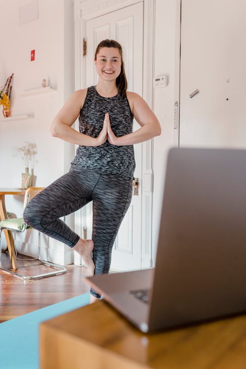 Woman Doing Online Yoga Class