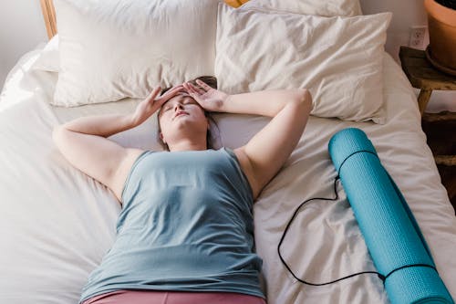 Free Woman Tired From Doing Yoga Stock Photo