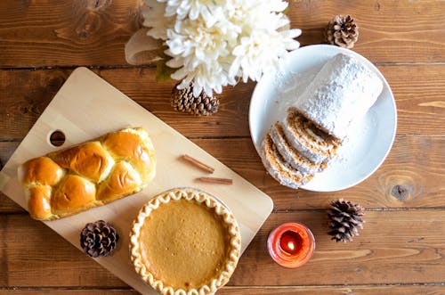 Delectable Baked Goods Placed on Wooden Surface