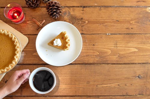 Sliced Pumpkin Pie on Ceramic Plate