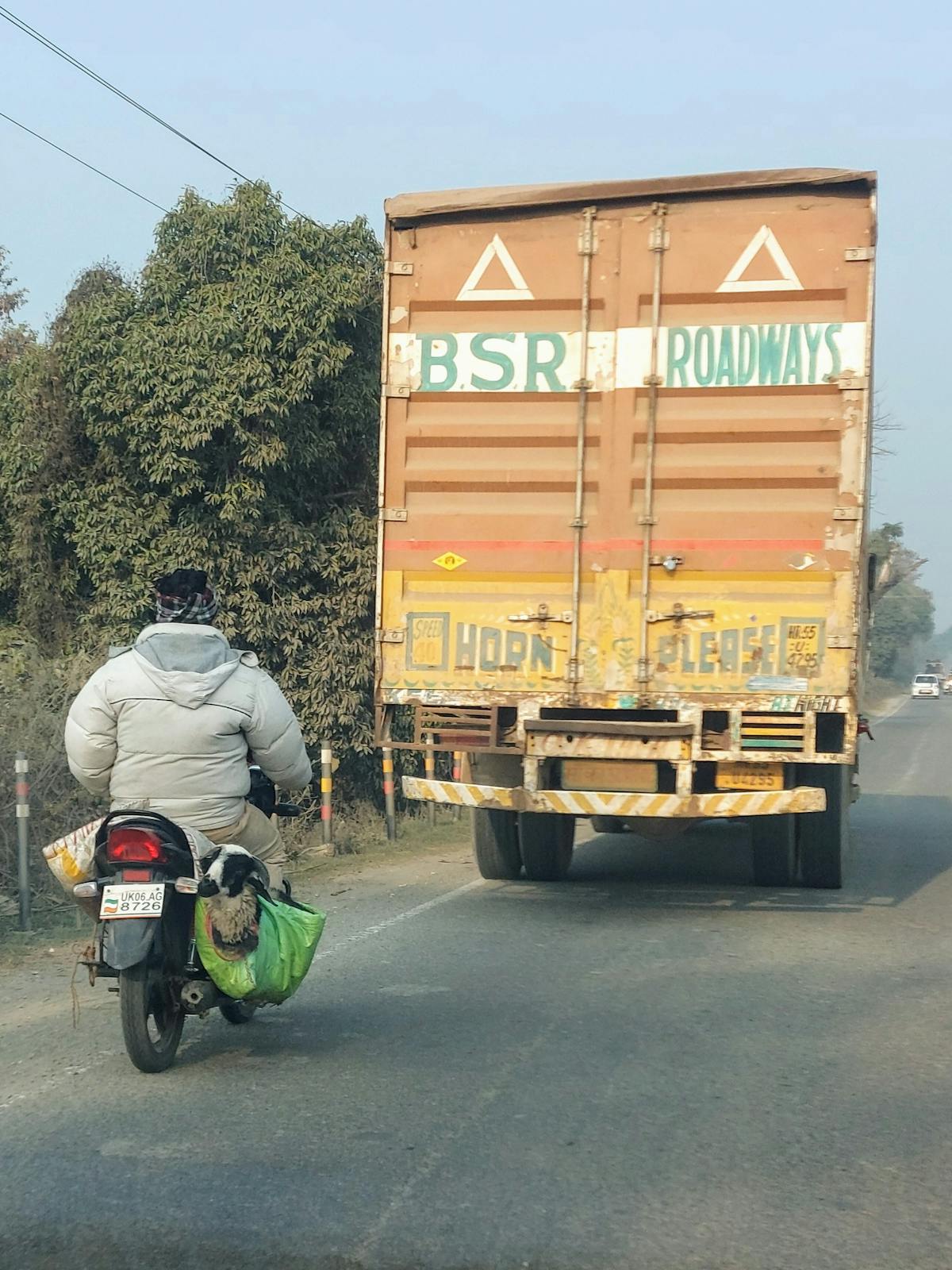 Person walking outdoors in the evening in a relaxed way
