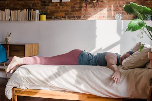 Free Woman Sleeping on Her Bed Stock Photo