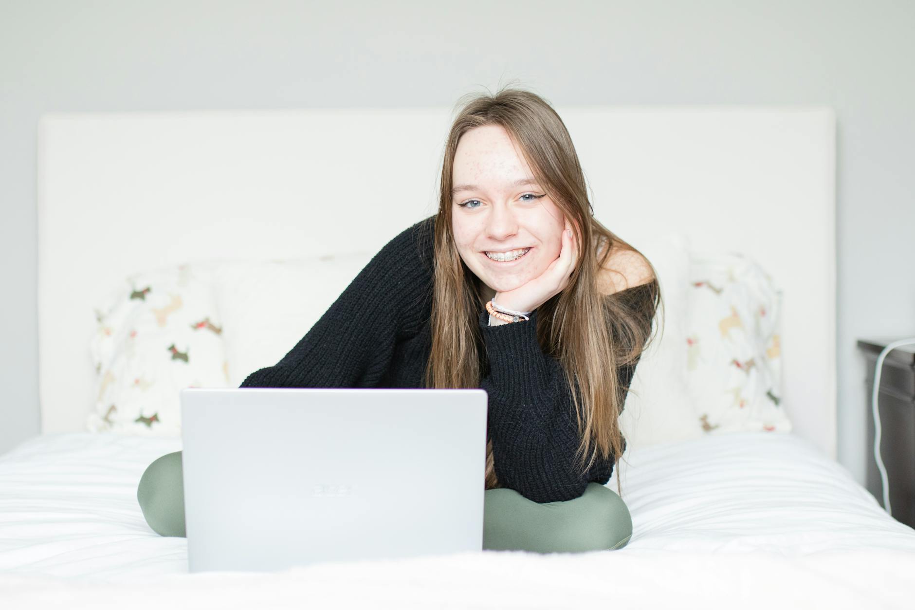 Weed Removal for Cutworm Prevention Hand pulling weeds in a vegetable garden to deter cutworms