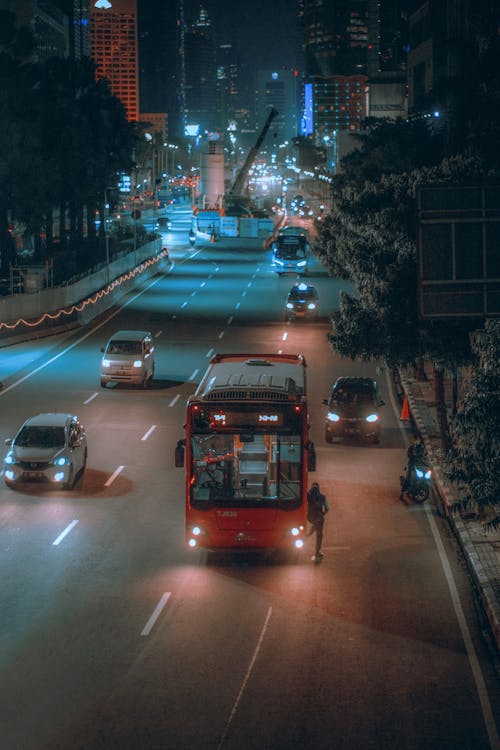 Free Bus and Cars on the Road Stock Photo