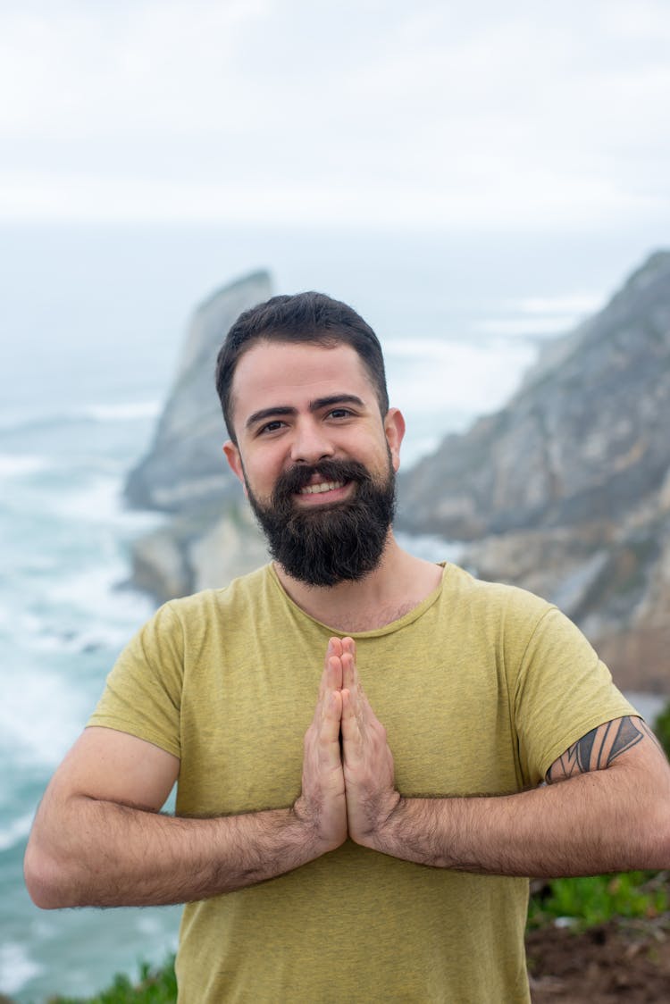 A Bearded Man Doing Prayer Position