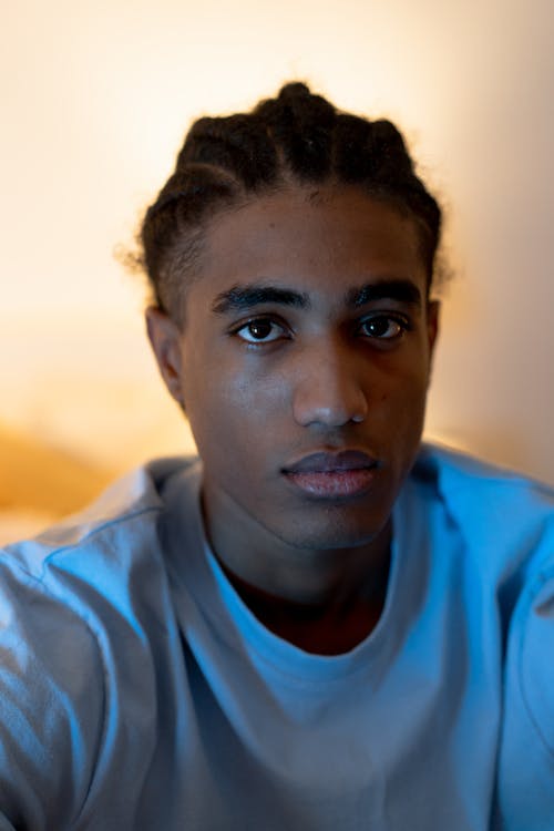 Young Man with Braided Hair