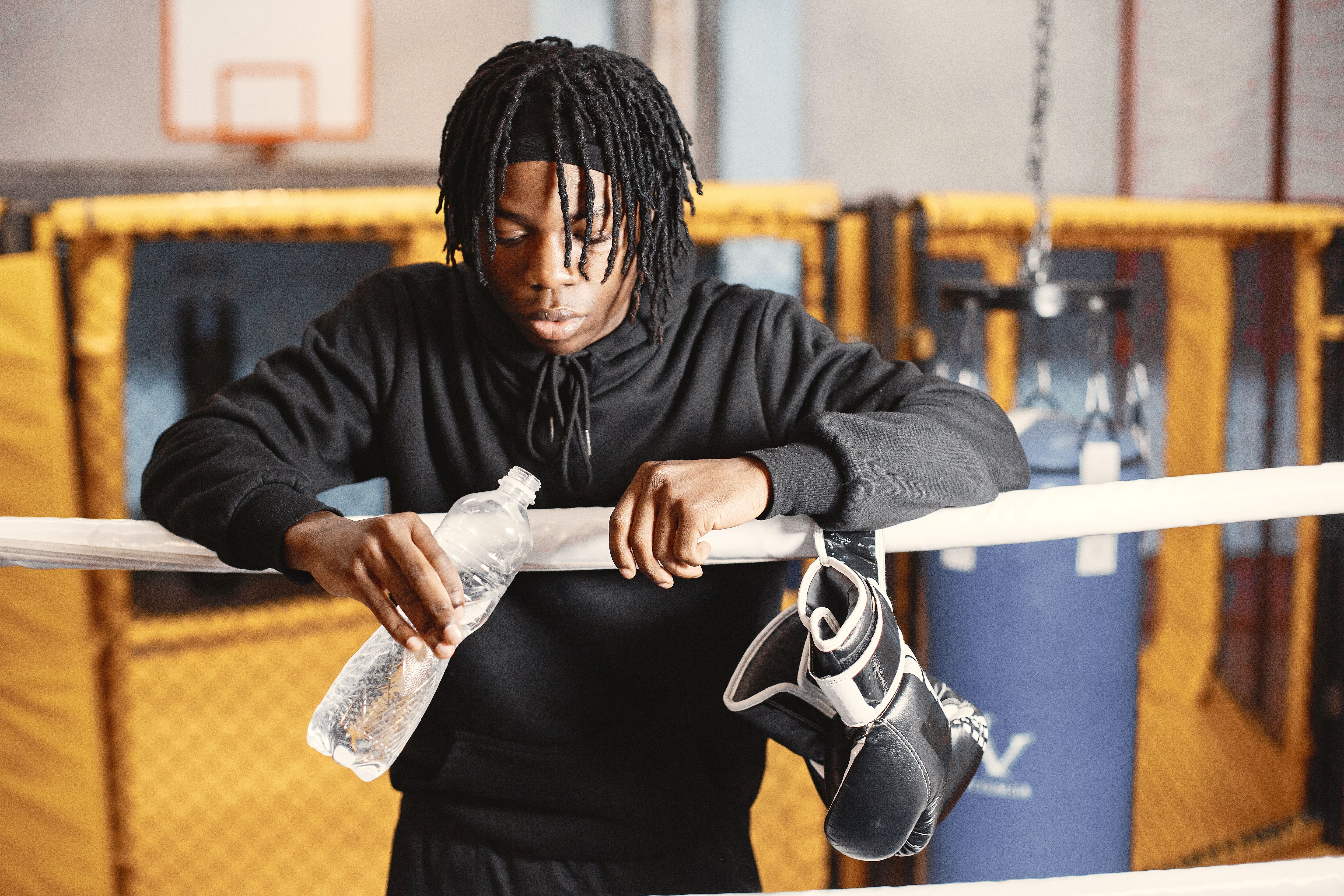 Person taking a break during a workout, the kind of setting where a gentle spray is more comfortable than alcohol
