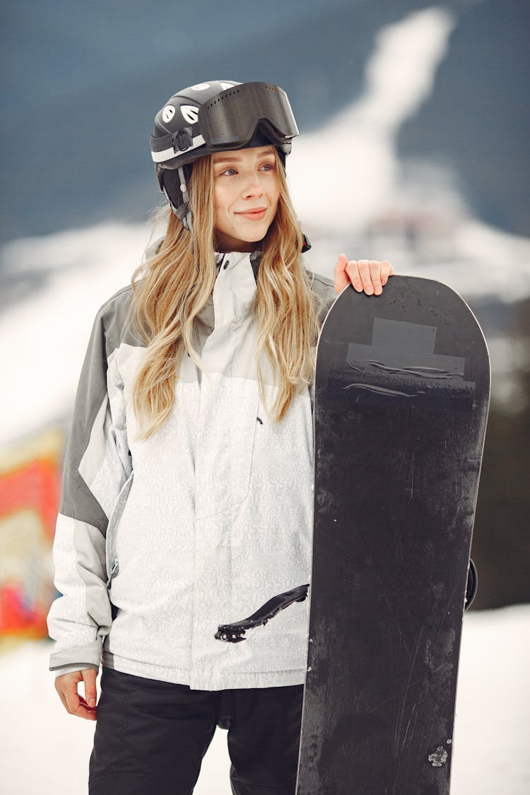 Woman With Skiing Equipment