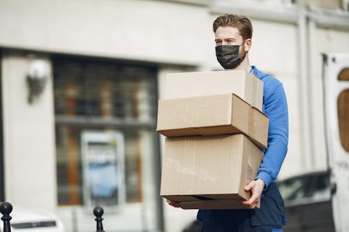 Deliveryman Carrying Boxes