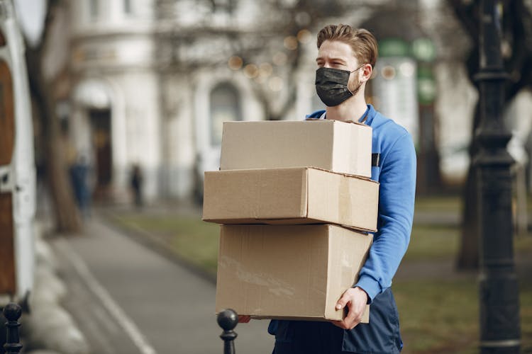 Delivery Worker Carrying Boxes