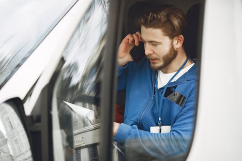 A Man in a Phone Call in a Vehicle