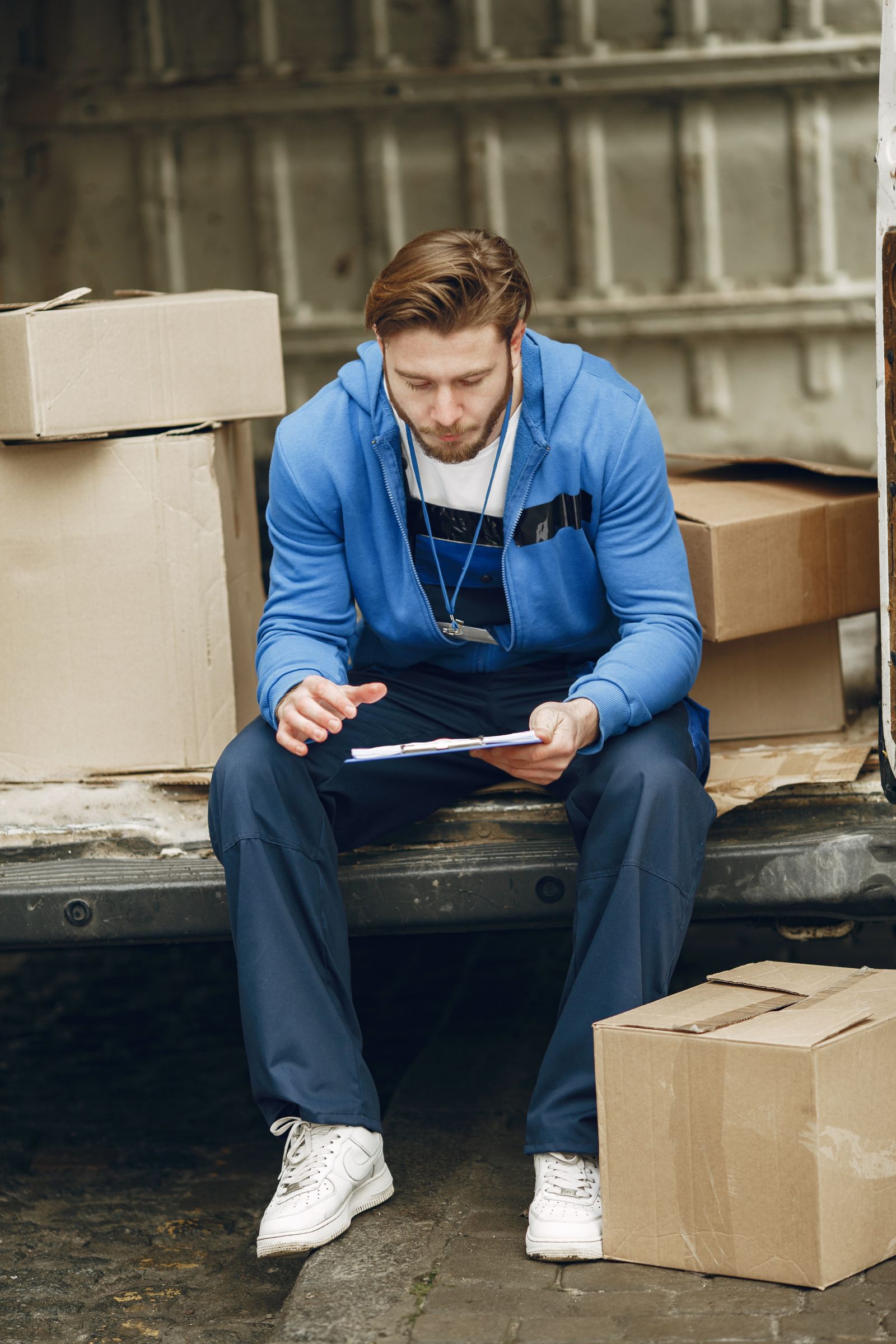 Warehouse inventory specialist validating operational data during a commerce migration