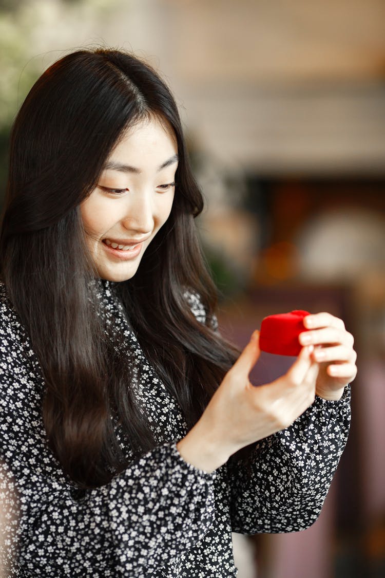 Woman Holding Ring Box