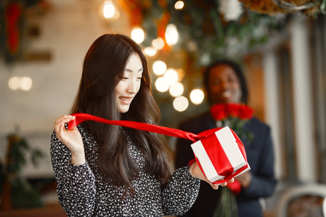 Woman Unpacking Present