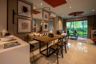 A Dining Area Beside Living Room