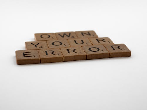 Free Scrabble Tiles on the Table Stock Photo