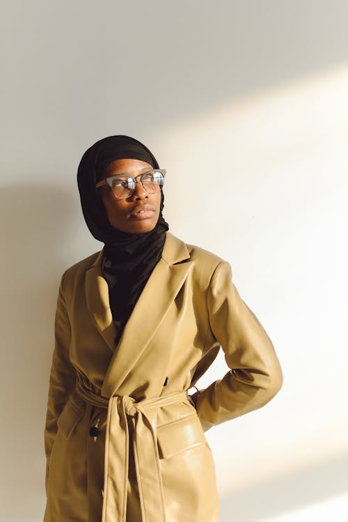 Free Portrait of Woman in Headscarf and Trench Coat  Stock Photo