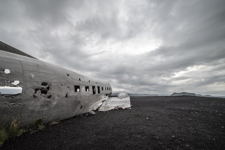 Dilapidated Airplane On The Ground