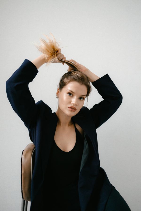 Double twist low ponytail party hairstyle