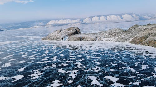 Frozen Lake Near Rock Formation