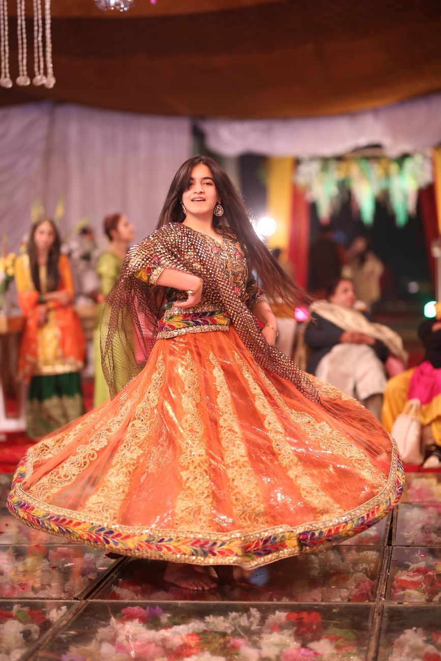 Colorful Traditional Dress Dances Energetically