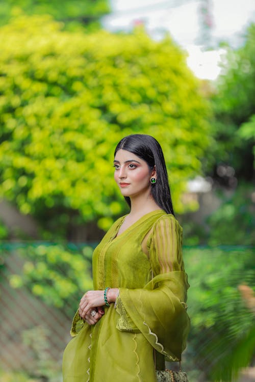 A Woman Wearing Green Dress