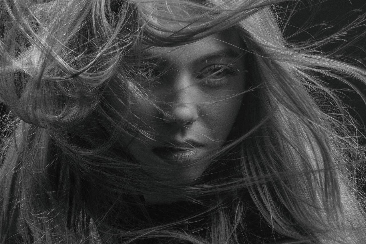 striking black and white close up portrait capturing the intense gaze