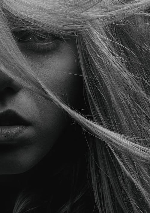 Grayscale Photo of Woman's Face