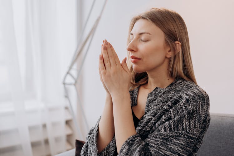 Woman Meditating In Close-up View