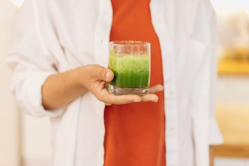Free Person Holding Clear Drinking Glass Of Fresh Smoothie Stock Photo
