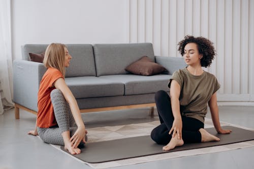 Free Two Women Doing Yoga Stock Photo
