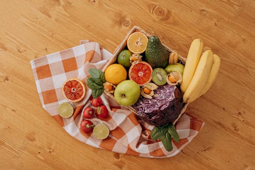 Assorted Fruits on Brown Wooden Basket