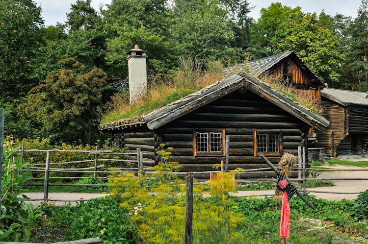 A Wooden House With A Sod Roof