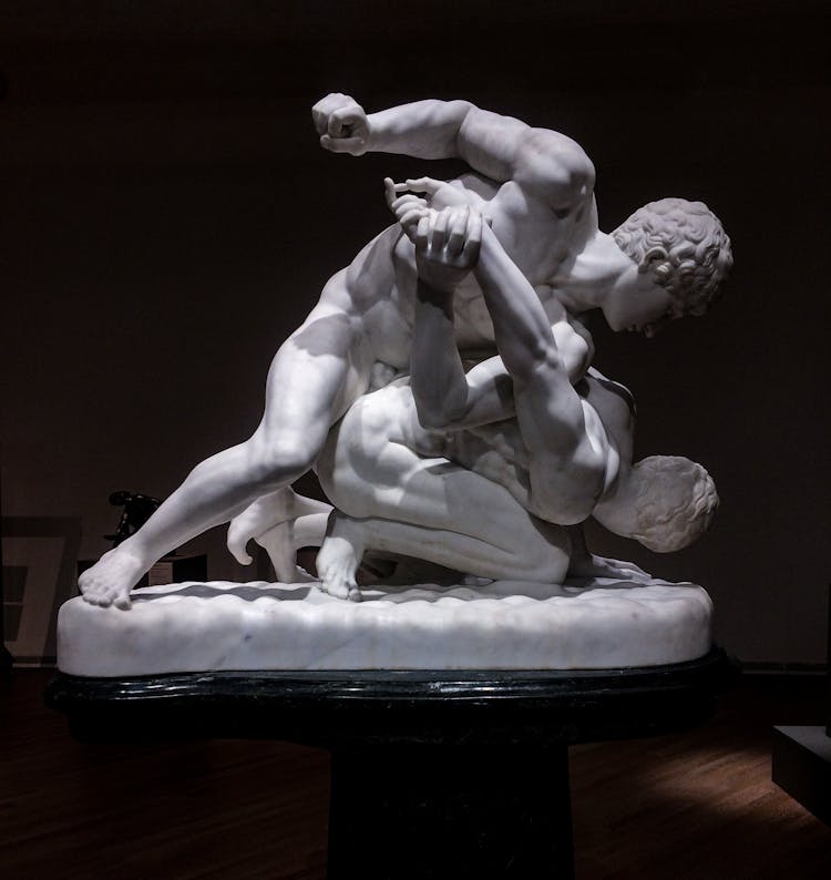 Ancient Statue Of Two Men Wrestling 