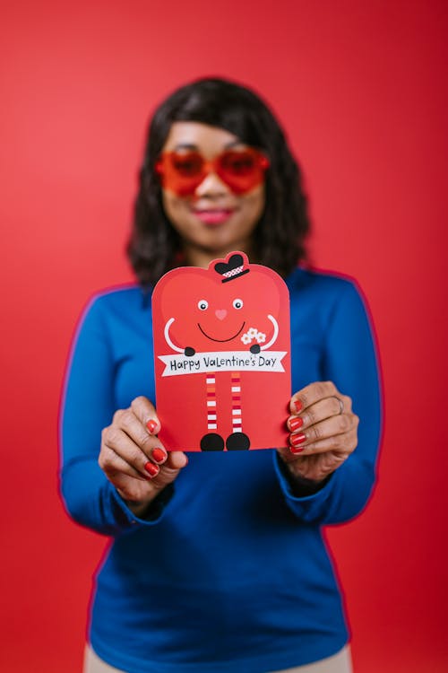 Woman Holding a Valentines Card