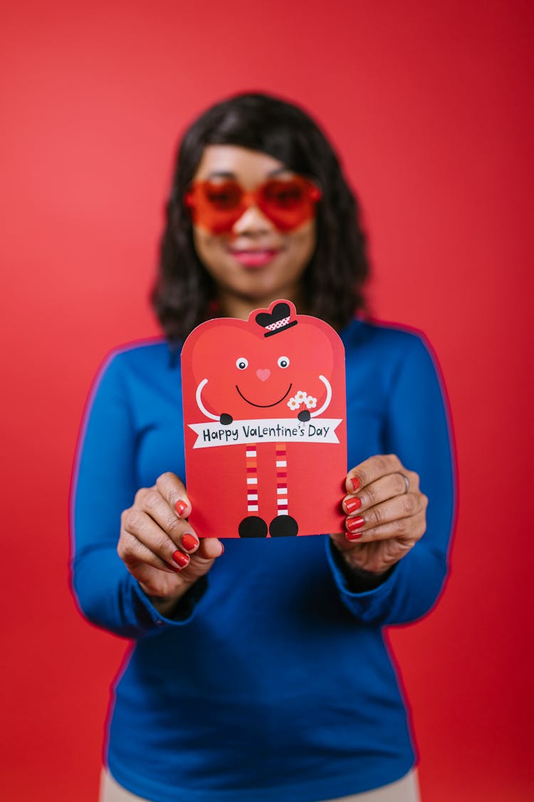 Woman Holding A Valentines Card