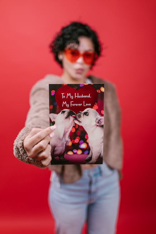 Woman Holding a Valentines Card