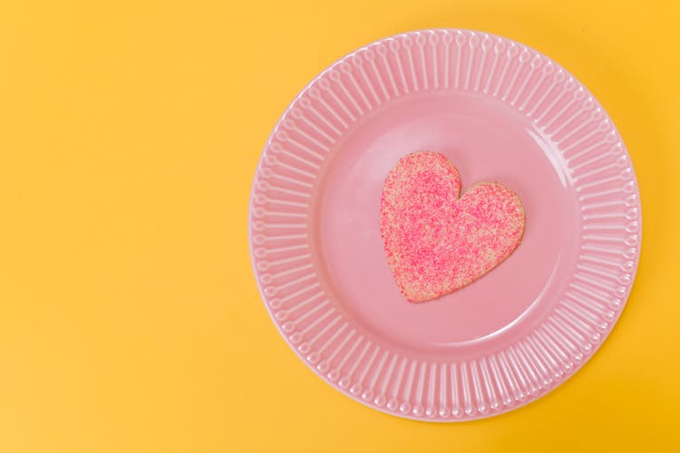 Pink Heart Shaped Cake On Paper Plate