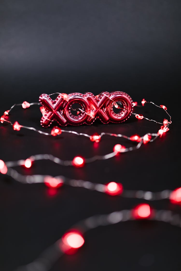 Red Xoxo And String Lights On Black Background