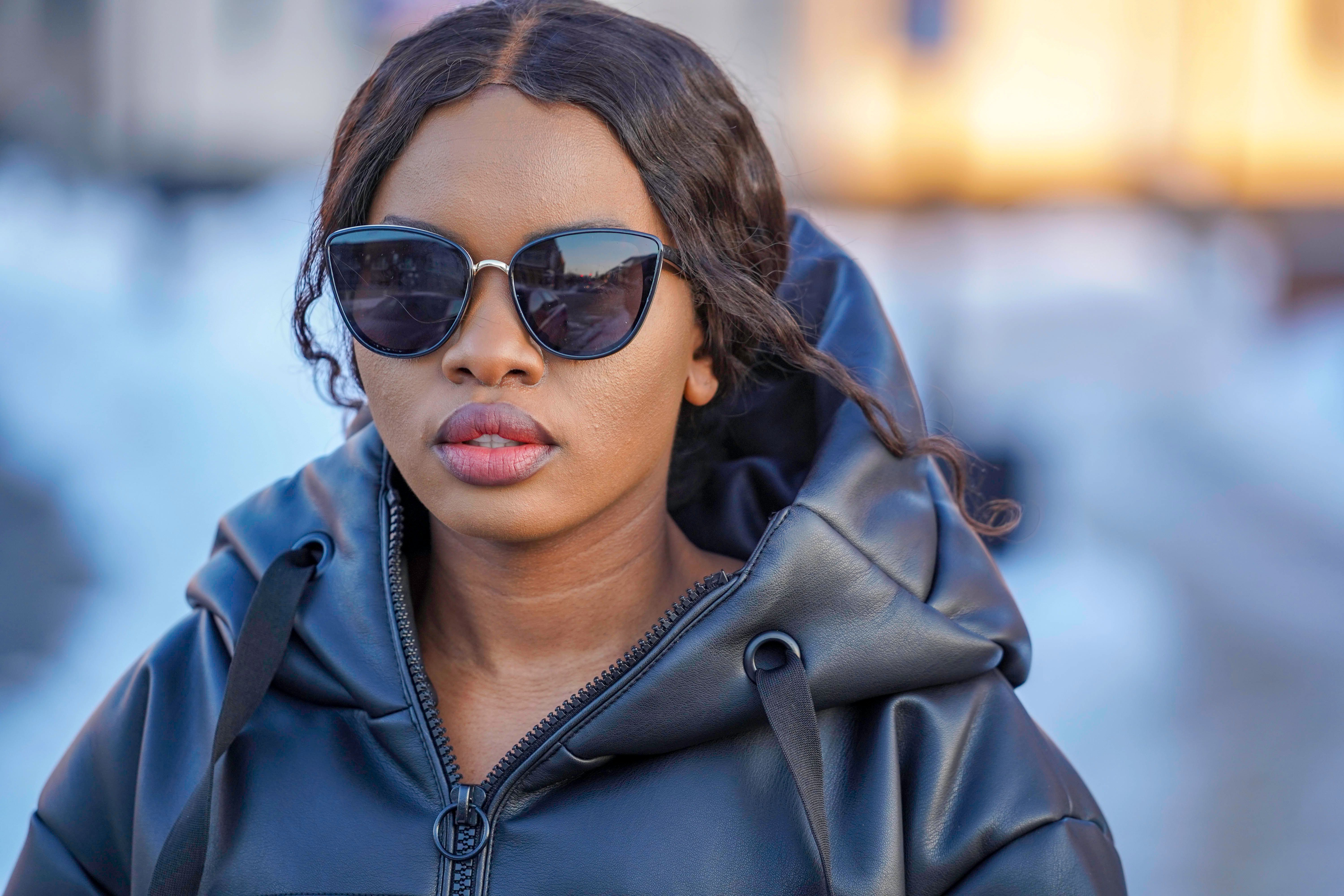 Woman in Black Leather Jacket and Sunglasses · Free Stock Photo