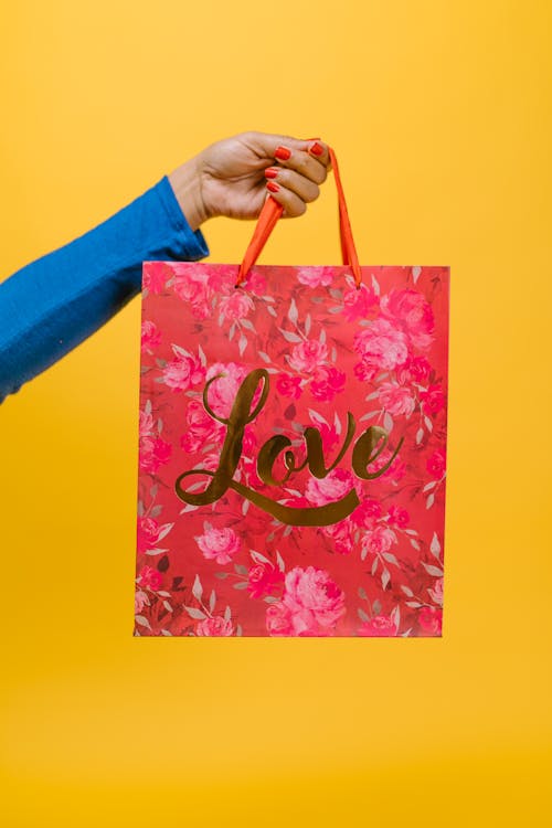 Free Person Holding Pink Floral Tote Bag Stock Photo