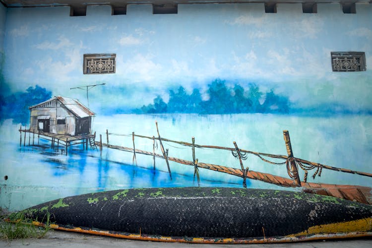 Blue Colored Graffiti On Wall