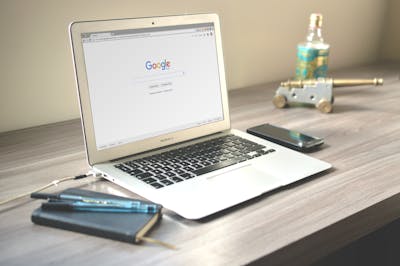 A laptop for working on SEO for small businesses 