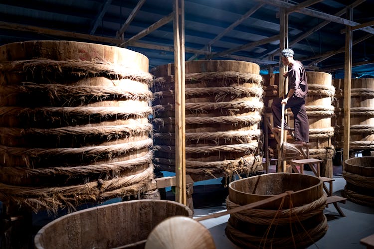 Large Wooden Barrels In A Warehouse