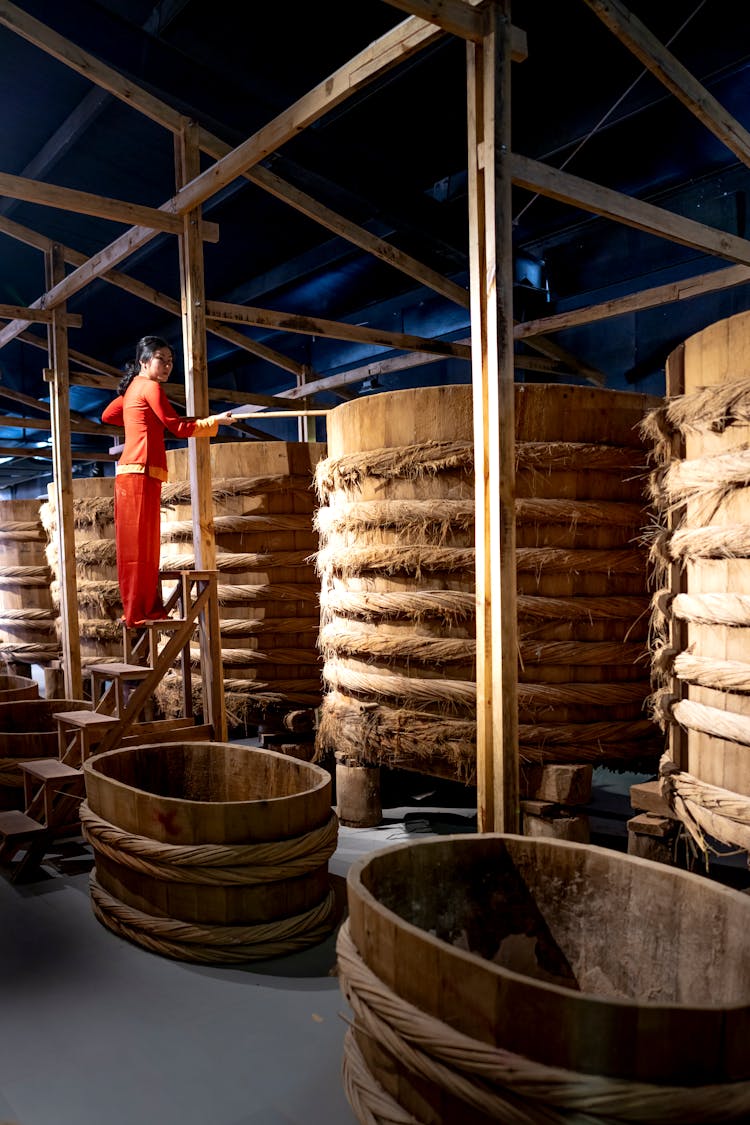 Large Wooden Barrels In A Warehouse