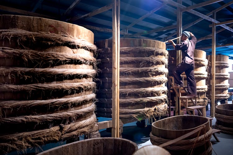 Large Wooden Barrels In A Warehouse