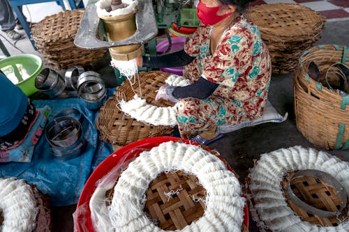 A Woman Making Street Food