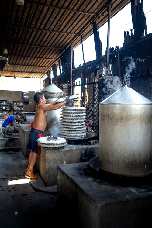 Man making noodle in factory