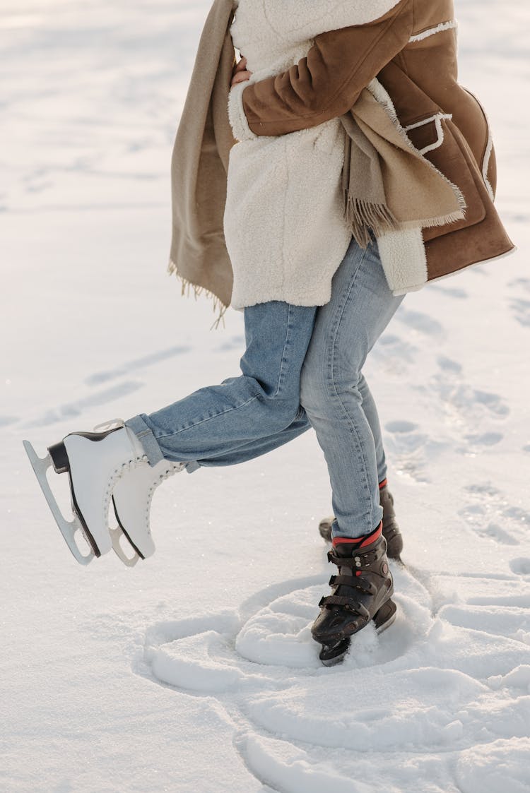 People Wearing Ice Skating Shoes