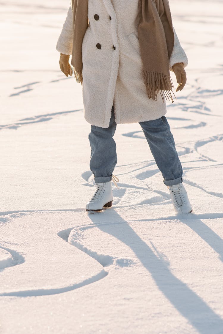 Person Wearing A White Ice Skating Shoes